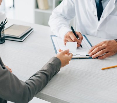 Patient paying for treatment