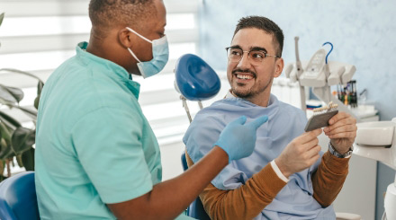 dental-patient-talking-with-dentist