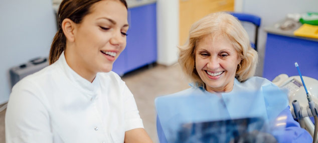 dentist-showing-xray-to-dental-patient